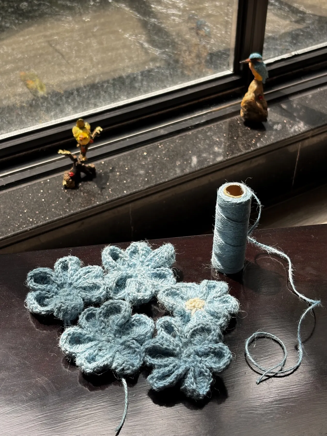 A crocheted choker worn at the neck.