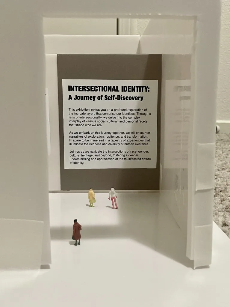Entrance of the model with the exhibition title wall.
