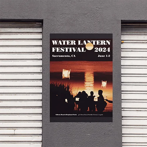 Water Lantern Festival poster photographed on a wall.