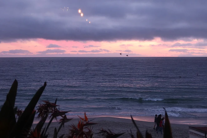 A pink evening sky over the ocean.